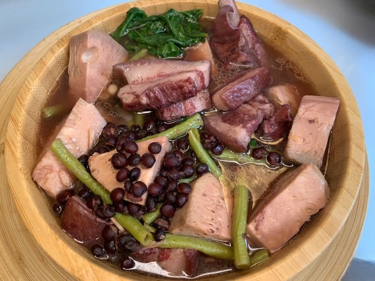 Close-up of KBL, a traditional Filipino soup made with Kadyos (pigeon peas), Baboy (pork), and Langka (green jackfruit), a popular dish from Iloilo.