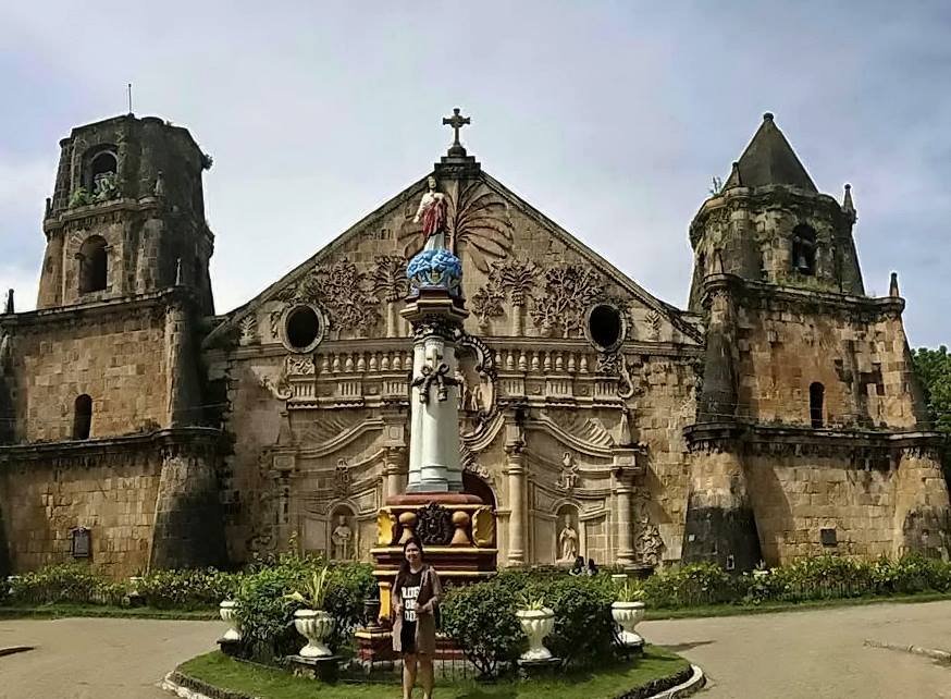 Front view of Miag-ao Church, a UNESCO World Heritage site in Iloilo, Philippines, known for its unique Baroque architecture.