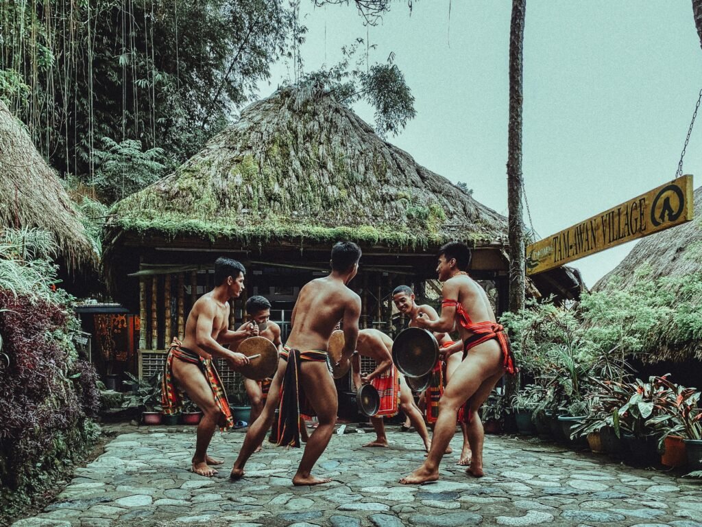 "Group of tourists exploring the lush landscapes and cultural sites in Baguio City, known as the summer capital of the Philippines.